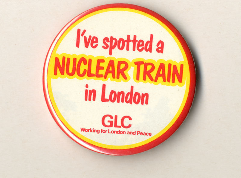 A badge reading “I have spotted a nuclear train in London” with the red writing in nuclear train being highlighted in yellow and being labelled as from the GLC.