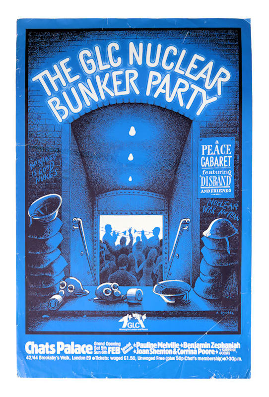 A bright blue poster with fluorescent logo reading “THE GLC NUCLEAR BUNKER PARTY” on an illustrated brick wall above the entrance of a flight of stairs, surrounded by gas masks and bags, that appears to lead to a club celebration or “party”.